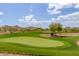 Scenic view of lush golf course with blue skies and scattered desert vegetation at 7600 E Golden Eagle Cir, Gold Canyon, AZ 85118
