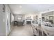 Office features a stone fireplace, a modern desk setup, and direct access to the backyard at 8408 E Lewis Ave, Scottsdale, AZ 85257