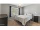 Well-lit bedroom featuring neutral paint, carpet, and a bright window creating a welcoming and relaxing space at 8787 E Mountain View Rd # 2016, Scottsdale, AZ 85258