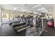 Well-equipped gym with modern exercise machines, offering a convenient fitness center for residents at 8787 E Mountain View Rd # 2016, Scottsdale, AZ 85258