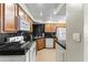 This kitchen features stainless steel appliances, granite countertops, and stylish cabinetry at 8787 E Mountain View Rd # 2016, Scottsdale, AZ 85258