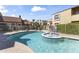 Sparkling community pool and spa surrounded by lush landscaping and comfortable seating, a great place to unwind and relax at 8787 E Mountain View Rd # 2016, Scottsdale, AZ 85258