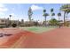 Community tennis court surrounded by lush greenery, offering recreational opportunities at 8787 E Mountain View Rd # 2016, Scottsdale, AZ 85258