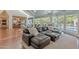 Vaulted ceilings and fireplace complement the layout of the living room that flows to the outdoor living area at 9041 N 46Th St, Phoenix, AZ 85028