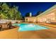 Inviting backyard pool area with patio seating under the stars at 9041 N 46Th St, Phoenix, AZ 85028