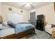 Bedroom with comfortable furnishings, natural light, and warm decor at 4053 N 308Th Ln, Buckeye, AZ 85396