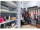 A well-organized walk-in closet with ample storage space for clothes, shoes and accessories at 4053 N 308Th Ln, Buckeye, AZ 85396
