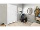 Clean foyer featuring tiled flooring and ample space, showcasing a practical and tidy entrance at 4053 N 308Th Ln, Buckeye, AZ 85396