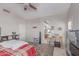 A bright bedroom that features a view into a bathroom, and an organized storage area at 4302 E Mountain Vista Dr, Phoenix, AZ 85048