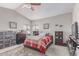 Comfortable bedroom featuring a ceiling fan, natural lighting, and space for storage and personalization at 4302 E Mountain Vista Dr, Phoenix, AZ 85048