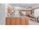 Spacious kitchen with oak cabinetry, granite countertops, stainless steel appliances, and a kitchen island at 4302 E Mountain Vista Dr, Phoenix, AZ 85048