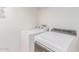 Efficient laundry room with a washing machine and a dryer, ready for your laundry needs at 4302 E Mountain Vista Dr, Phoenix, AZ 85048