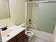 Well-lit bathroom featuring a sink, toilet, and combination shower and bathtub at , Tempe, AZ 85282