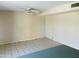 Living room with tile flooring, a ceiling fan, and neutral paint tones, ready for personalization at , Tempe, AZ 85282