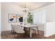 Bright dining area with a marble-top table and neutral-toned chairs, perfect for entertaining at 10316 E Rimrock Loop, Gold Canyon, AZ 85118
