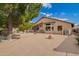 Expansive backyard showcasing a covered patio, scenic views, and an inviting outdoor setup at 10804 W Mohawk Ln, Peoria, AZ 85373