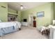 Bright and airy bedroom featuring neutral colors and a sitting area at 10804 W Mohawk Ln, Peoria, AZ 85373