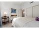 Serene bedroom featuring a bed, neutral tones, and ample closet space at 10804 W Mohawk Ln, Peoria, AZ 85373