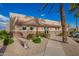 Exterior view of the community center, featuring stone accents, desert landscaping, and ample parking at 10804 W Mohawk Ln, Peoria, AZ 85373