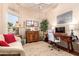 Comfortable office with natural light, workspace, desk and cozy seating at 10804 W Mohawk Ln, Peoria, AZ 85373