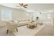 Bright living room with neutral tones, plush seating, and plenty of natural light at 15758 W Cortez St, Surprise, AZ 85379
