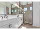 Modern bathroom featuring a spacious glass shower and double sink vanity at 21829 E Bonanza Ct, Queen Creek, AZ 85142