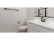 Modern bathroom featuring a sleek vanity with a black faucet, a toilet, and shower at 21829 E Bonanza Ct, Queen Creek, AZ 85142