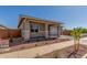 Desirable single-story home with stone accents, covered entryway and well-maintained landscaping at 21829 E Bonanza Ct, Queen Creek, AZ 85142