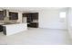 Open floor plan featuring an eat-in kitchen with dark wood cabinets, a kitchen island, and lots of natural light at 2442 W Rowel Rd, Phoenix, AZ 85085