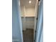 Walk-in closet with carpet and dual bars and shelving, offering efficient organization at 2470 W Rowel Rd, Phoenix, AZ 85085