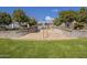 Outdoor community stairs leading to a gathering area with lush green lawn at 2563 E Muirfield St, Gilbert, AZ 85298