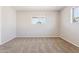 Bedroom with carpet flooring and a window with outside views at 5455 E Baltimore St, Mesa, AZ 85205
