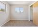 Well-lit bedroom with two windows and a closet, offering a comfortable and versatile space at 5455 E Baltimore St, Mesa, AZ 85205