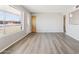 Airy living room with hardwood flooring and lots of natural light at 5455 E Baltimore St, Mesa, AZ 85205