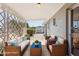 Covered patio with comfortable seating and an outdoor grill at 5455 E Baltimore St, Mesa, AZ 85205