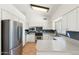 Bright kitchen featuring stainless steel appliances, granite countertops, tile backsplash, and white cabinets at 1165 E Avenida Kino --, Casa Grande, AZ 85122