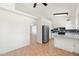 Open-concept kitchen featuring stainless steel appliances, tile floors, and white cabinets and lots of counter space at 1165 E Avenida Kino --, Casa Grande, AZ 85122