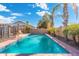 Beautiful backyard pool with patio area, pergola, desert landscaping and blue skies at 1165 E Avenida Kino --, Casa Grande, AZ 85122