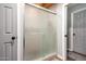 Bathroom with a frosted glass shower at 12229 N 121St Dr, El Mirage, AZ 85335