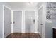 Bright entryway features message on wall and access to multiple rooms at 12229 N 121St Dr, El Mirage, AZ 85335