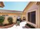 Private backyard with flower garden, barbeque, and courtyard area; great for outdoor entertaining at 13390 N 95Th Way, Scottsdale, AZ 85260