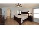Comfortable bedroom with a ceiling fan, a large closet, and soft, neutral decor at 13390 N 95Th Way, Scottsdale, AZ 85260