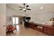 Spacious office featuring custom wood cabinets, a desk, and a sitting area at 13390 N 95Th Way, Scottsdale, AZ 85260