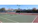 Well-maintained tennis courts with mountain views, offering a great amenity for active residents at 13390 N 95Th Way, Scottsdale, AZ 85260