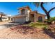 Charming two-story home featuring a neutral stucco exterior, tile roof, and a spacious two-car garage at 13711 N 81St Ave, Peoria, AZ 85381