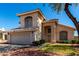 Charming two-story home featuring a neutral stucco exterior, tile roof, and a spacious two-car garage at 13711 N 81St Ave, Peoria, AZ 85381