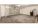 Spacious two car garage with ample room for vehicles and storage, offering convenience and functionality at 13711 N 81St Ave, Peoria, AZ 85381