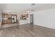 Open-concept kitchen and living area with updated appliances and ample counter space at 13711 N 81St Ave, Peoria, AZ 85381