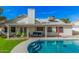 Beautiful backyard featuring a sparkling pool and covered patio at 1449 E Kent Ave, Chandler, AZ 85225