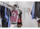 Walk-in closet with metal shelving and hanging racks for organizing clothing, shoes, and accessories at 1449 E Kent Ave, Chandler, AZ 85225